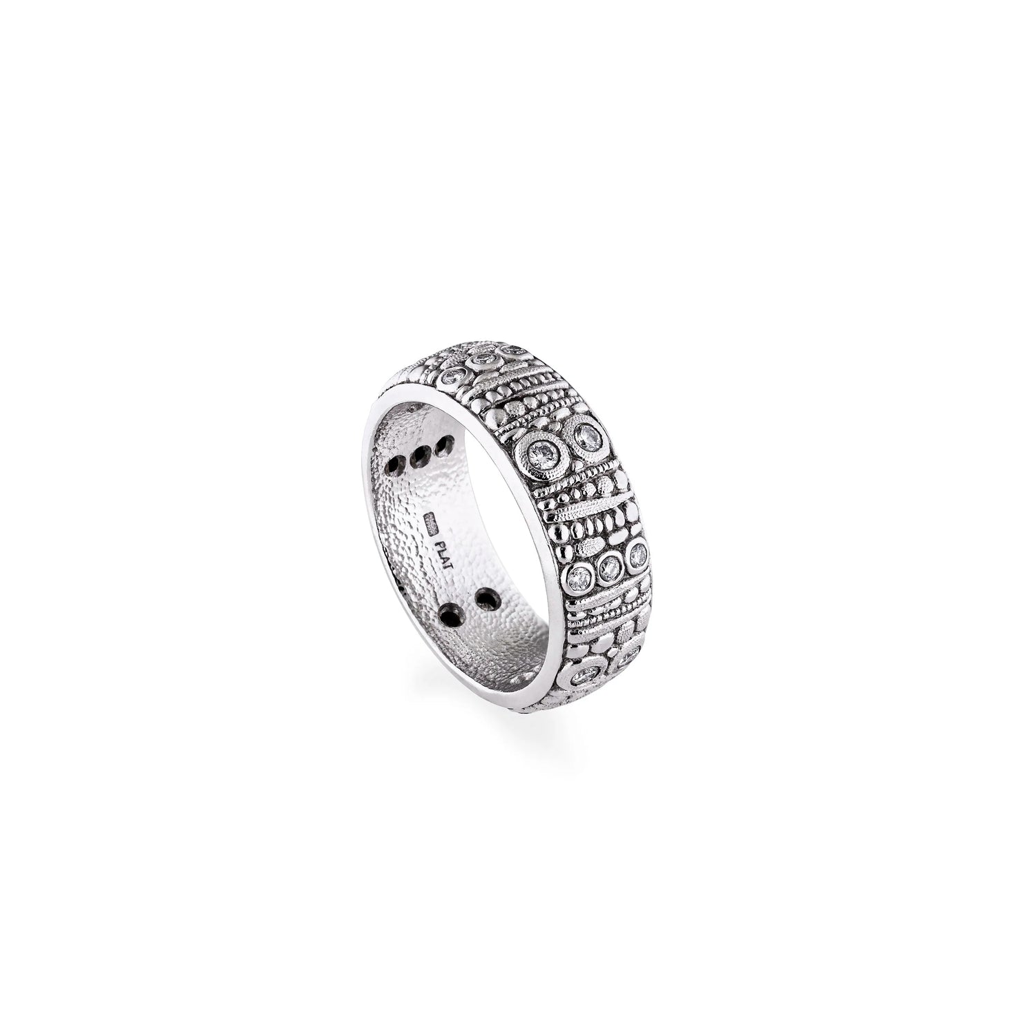 Carved platinum and diamond band