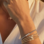three hearts bracelet with stretchy bracelets by Hulchi Belluni