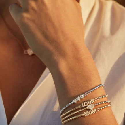 three hearts bracelet with stretchy bracelets by Hulchi Belluni