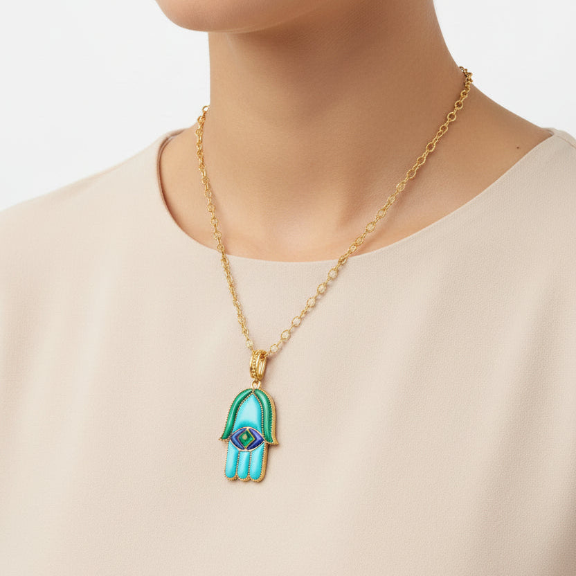 Orly Marcel Hamsa necklace with turquoise, malachite, lapis. yellow gold and Hamsa necklace.